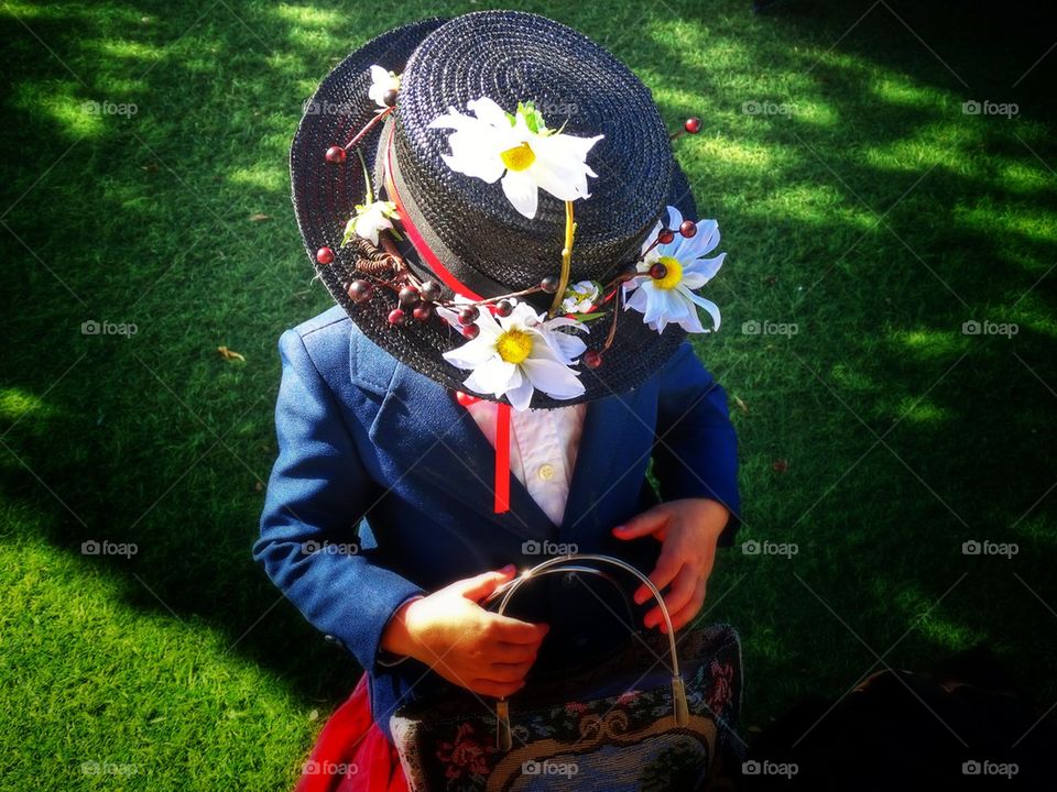 Little girl playing dress-up