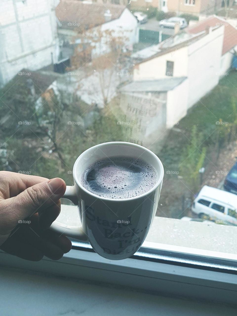 mulled red wine at the window