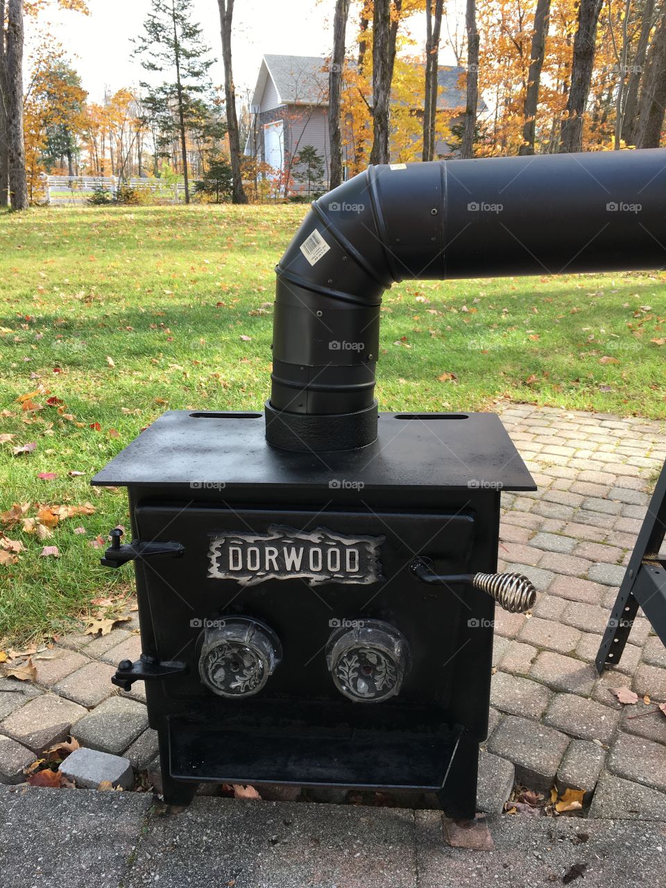 old wood stove i’m using to fire the wood smoker