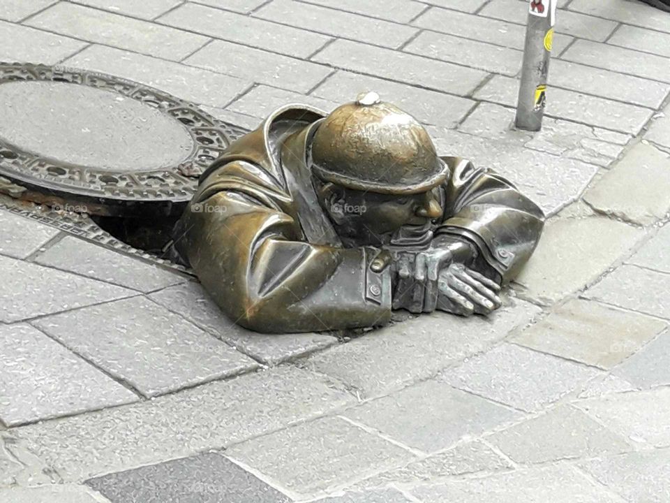 Bratislava.Man in the gutter.