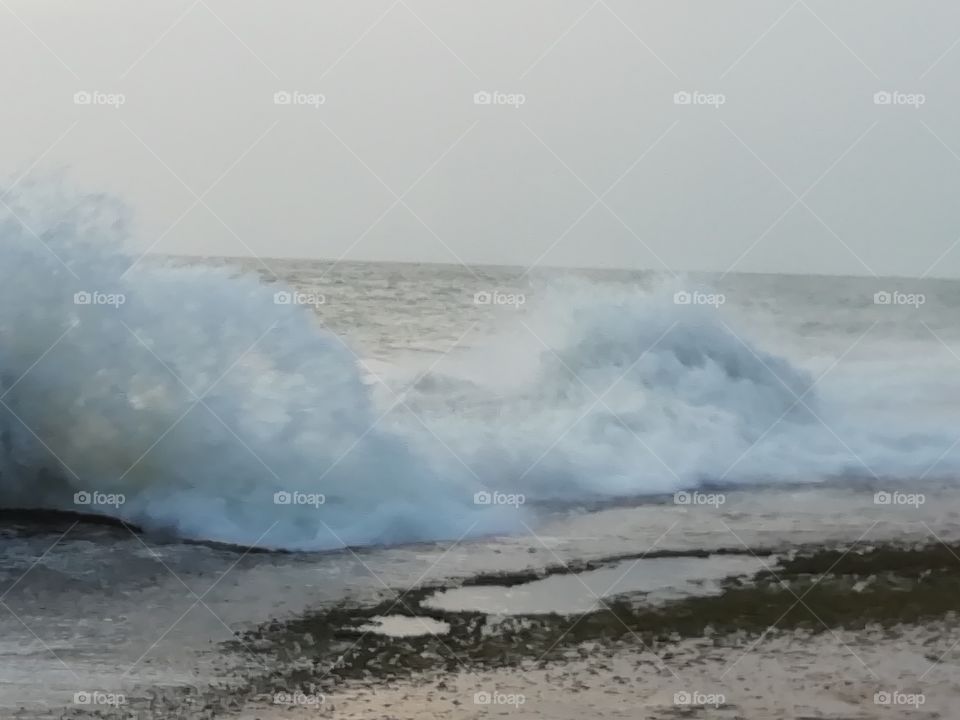 Sea water splashing on a evening