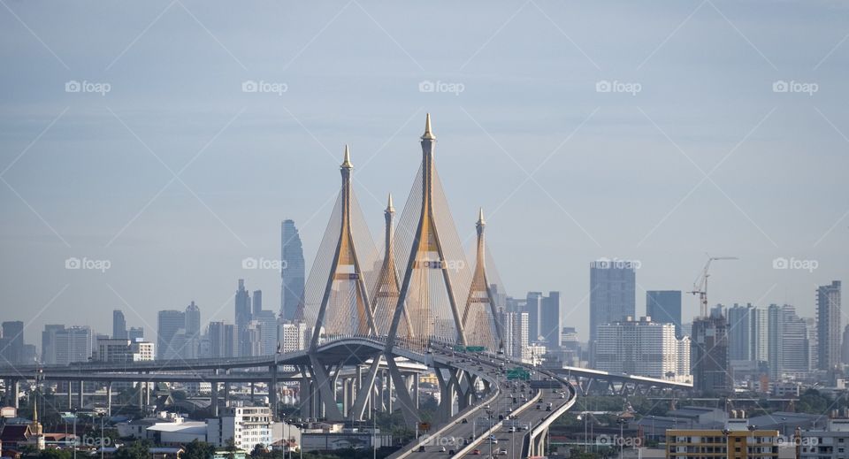 Road Leading line to the rule of thirds of beautiful contrast color landmark bridge of Bangkok Thailand