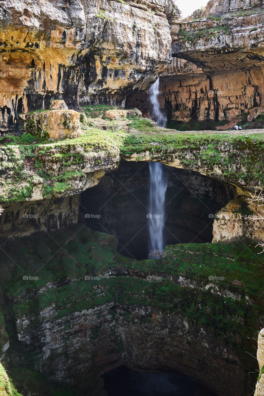 ...Breathtaking and worth visiting once in a lifetime...
Baatara Pothole.  Tannourine. Lebanon. It was discovered in 1952. The waterfall plunges 255m down the Tree Bridge Chasm
Geologists claim that the rock formation is around 160-million years old. 