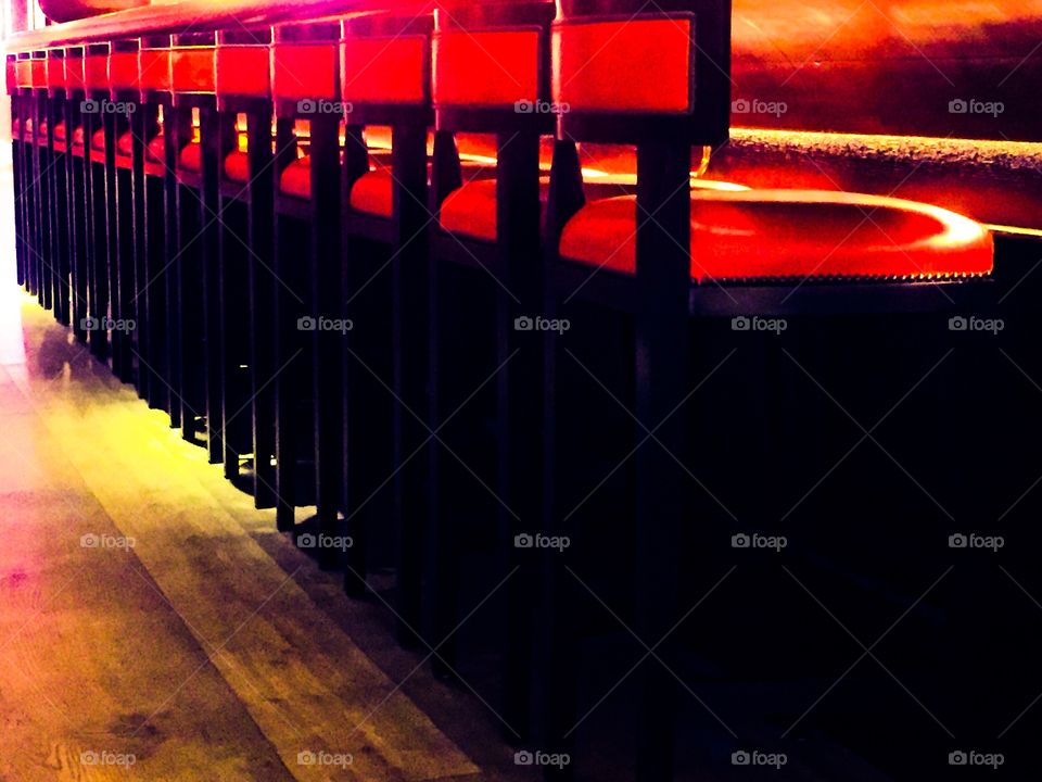 Bar stools in a row. 