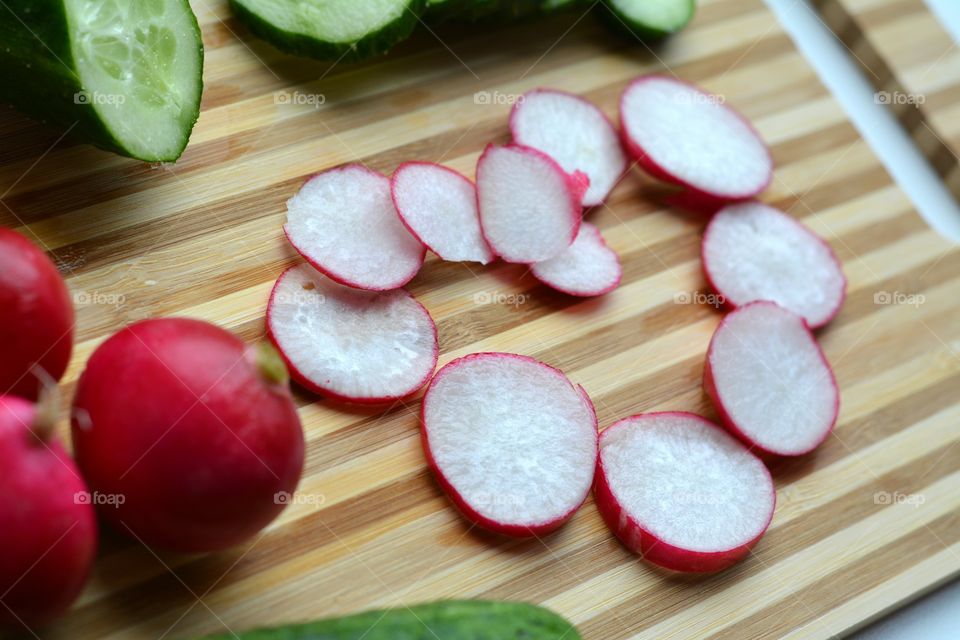 salad vegetables on a wooden board cooking home