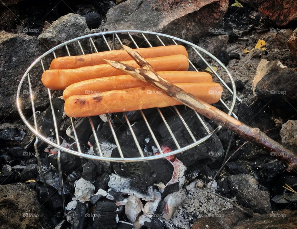 Grilling sausages