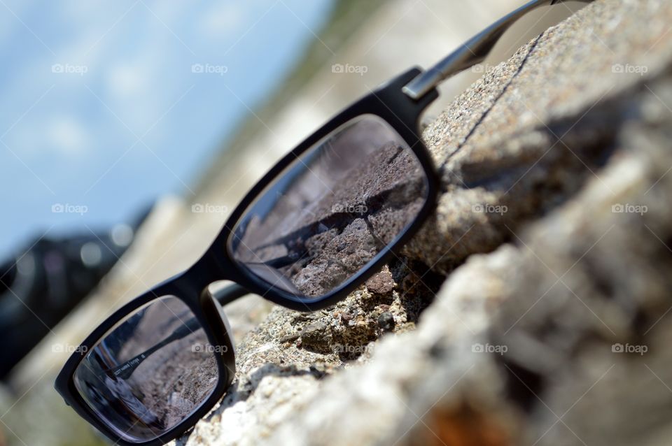 Black Sunglasses on Sand