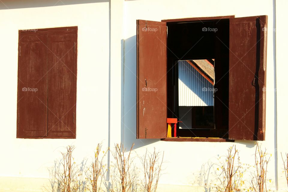 Classic windows.. Classic windows in Thailand. The wooden windows smooth and simple.