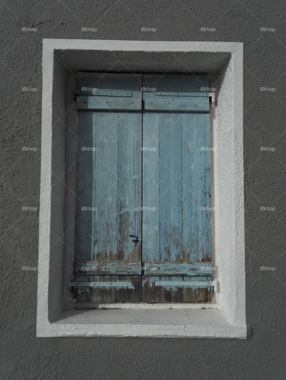 old light blue wood window