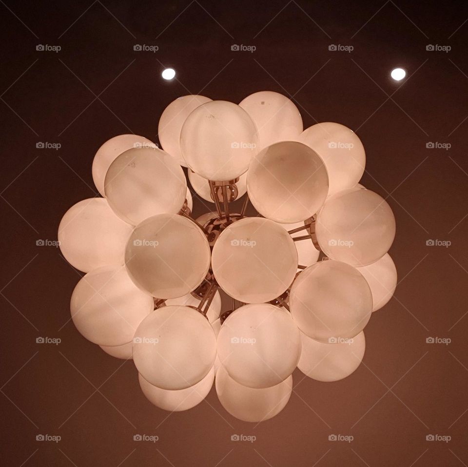 chandeliers with spherical light bulbs