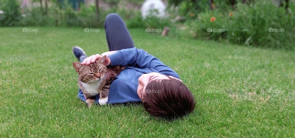 a boy with his cat