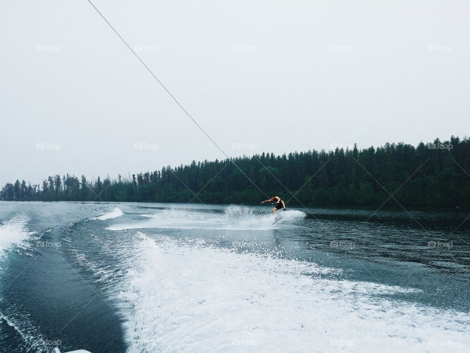 Wake boarding on the lake