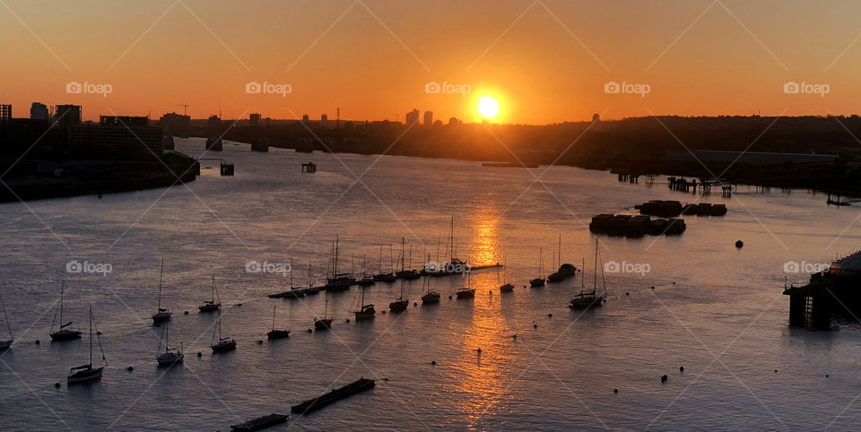 Sailing up the Thames at sunrise. 