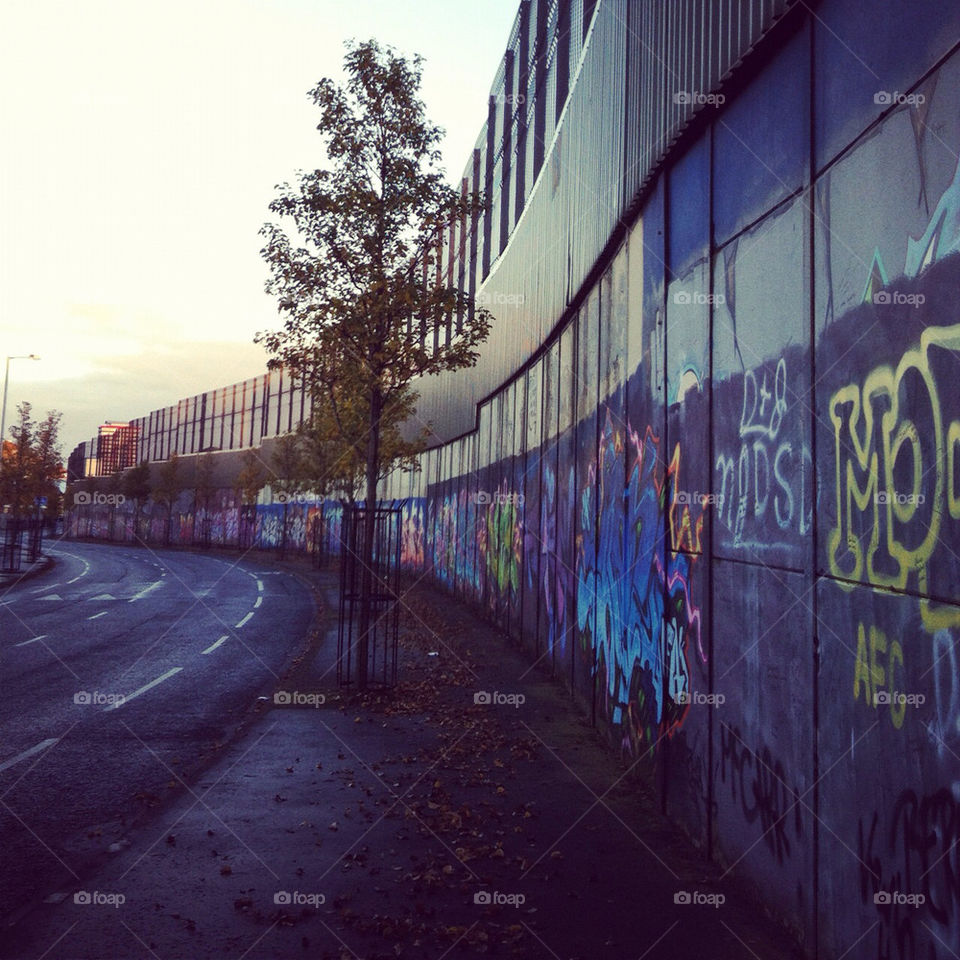 street graffiti wall fence by sarrem