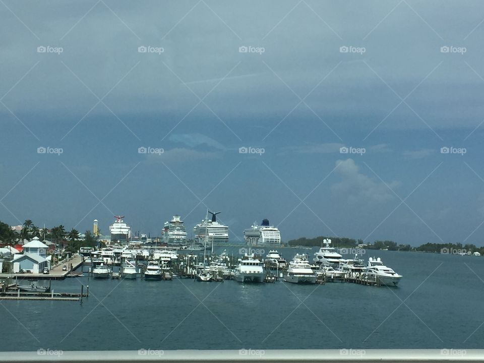 Four cruise ships along with yachts ported in Nassau Bahamas 