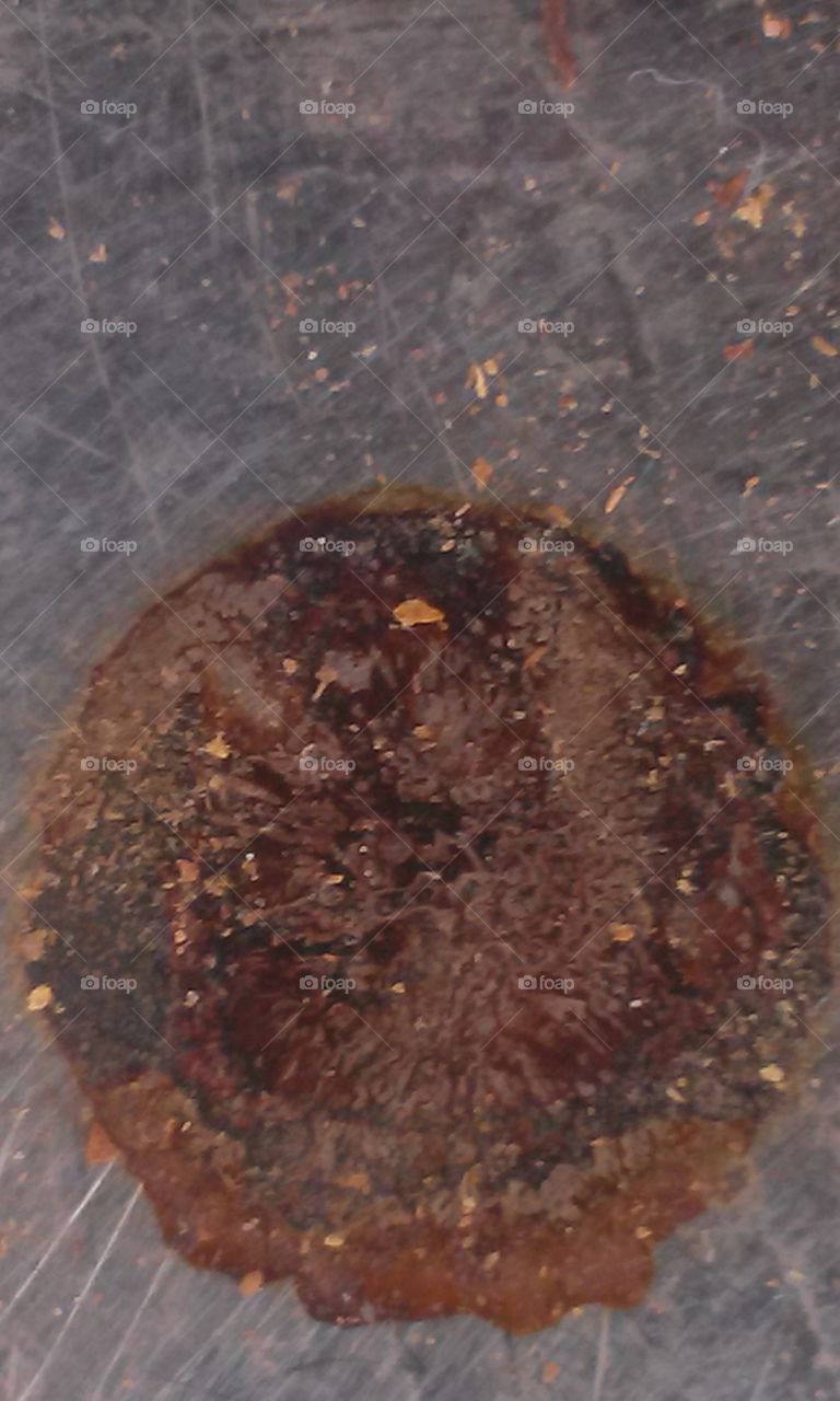 The   Round   Stain 
As i was cleaning around one day 
I happened along a Round Stain 
That just so happened to be on 
A metal round plate  , which
Gave a unusual design ,
Yet caught my eye enough to
Take a picture there on that 
Round metal plate , because 
Of the design , it gave a neat
Very unusual picture , which 
I could not resist upon taking
A photo there upon.