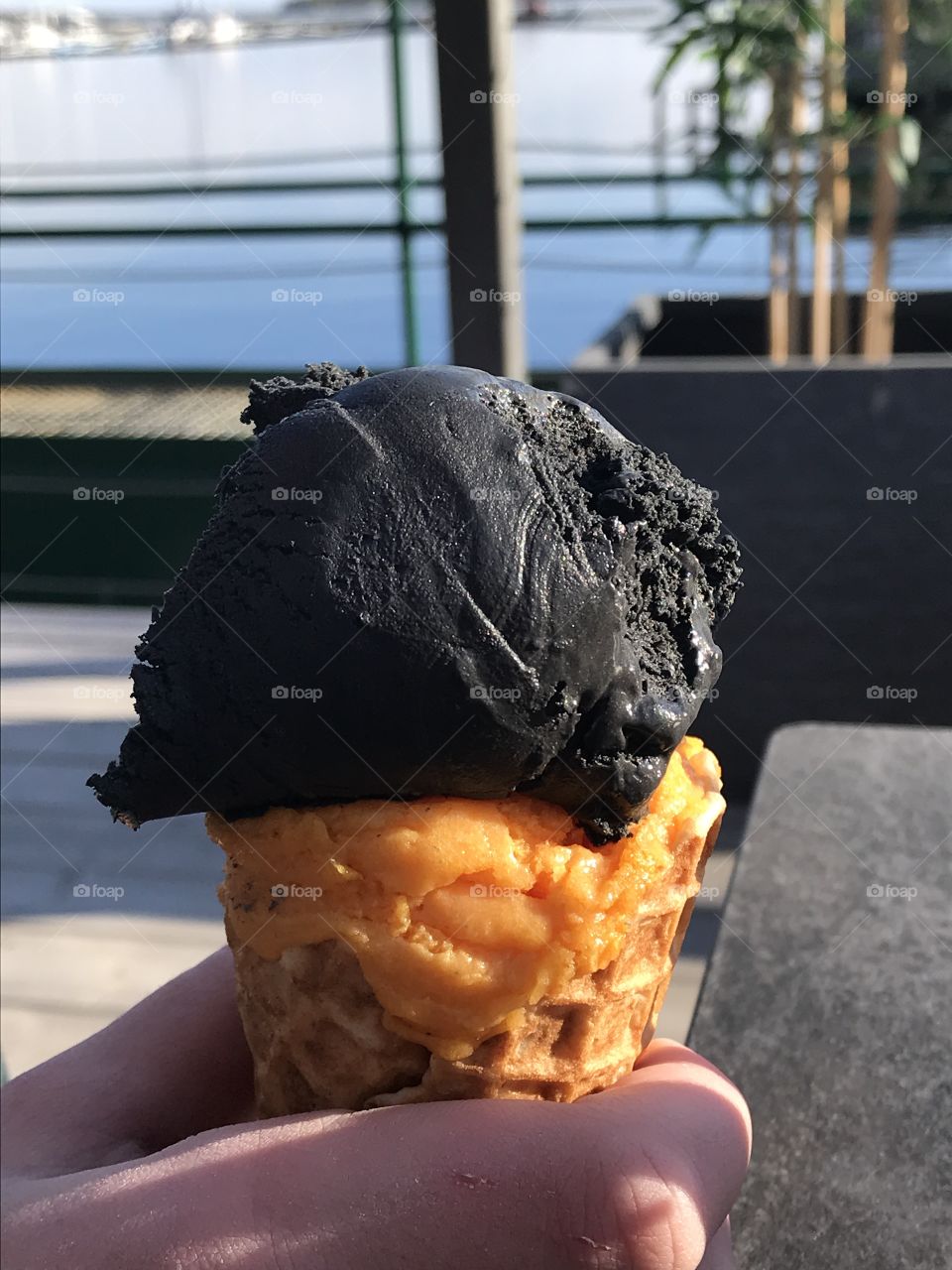 Black and orange colored  ice cream