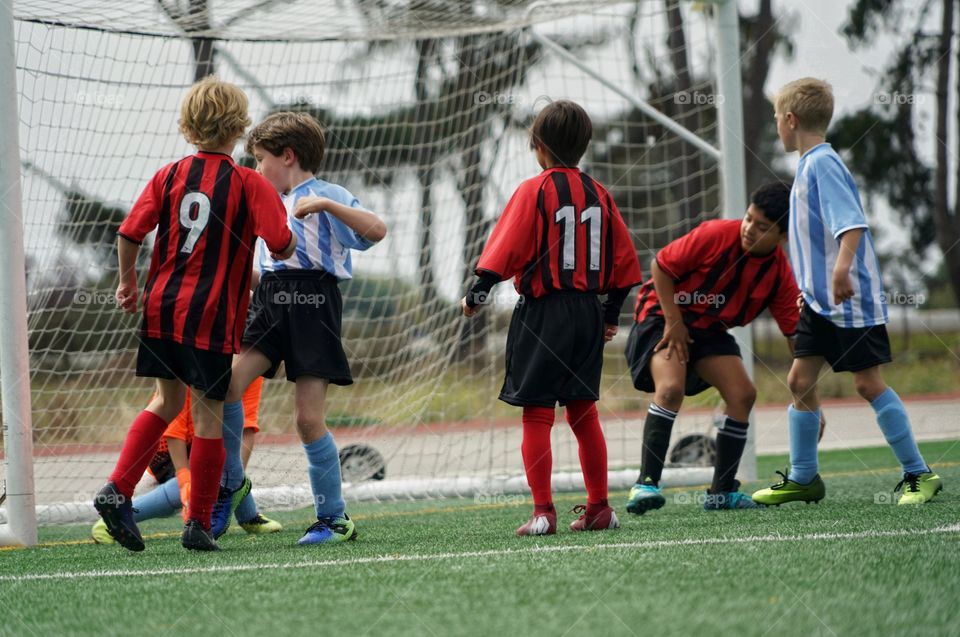 Kids Scoring Soccer Goal