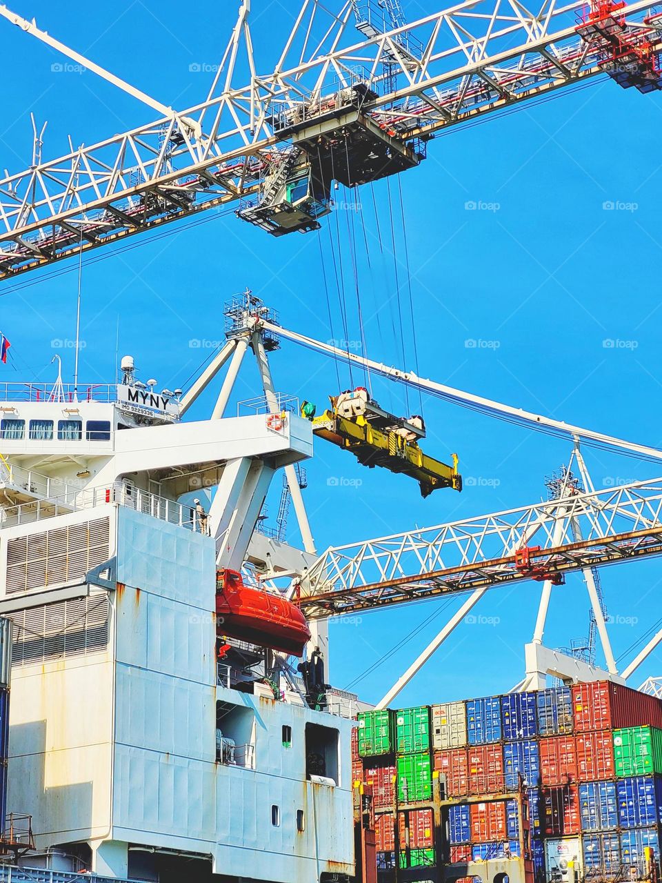 City view of Luka Koper at Adriatic seaside,  Slovenia.  Commercial cargo sea port with container cranes,  ships. Pilot boats
