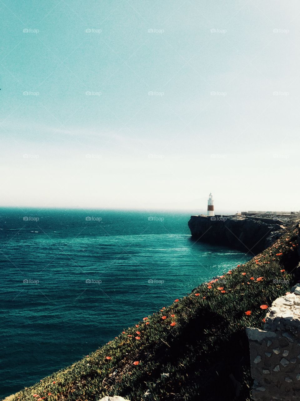 Scenic view of lighthouse at seaside