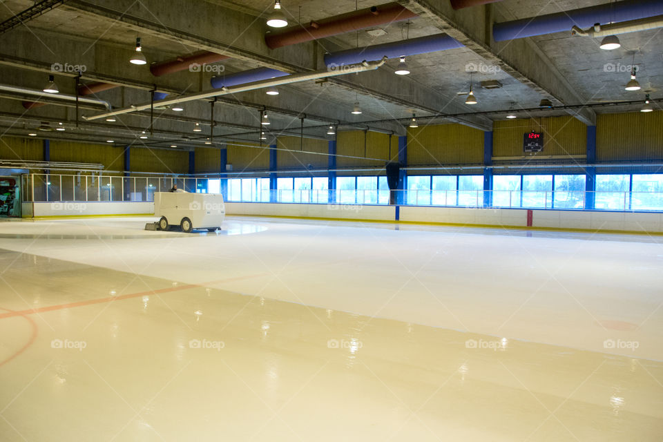 Ice resurfacing machine in work.
