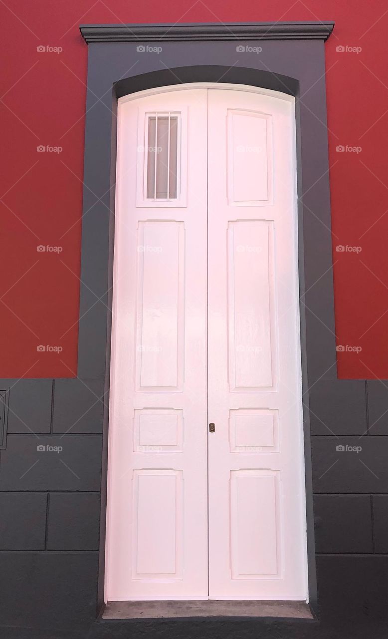 Large door, complimentary colors, colours, red, white, grey