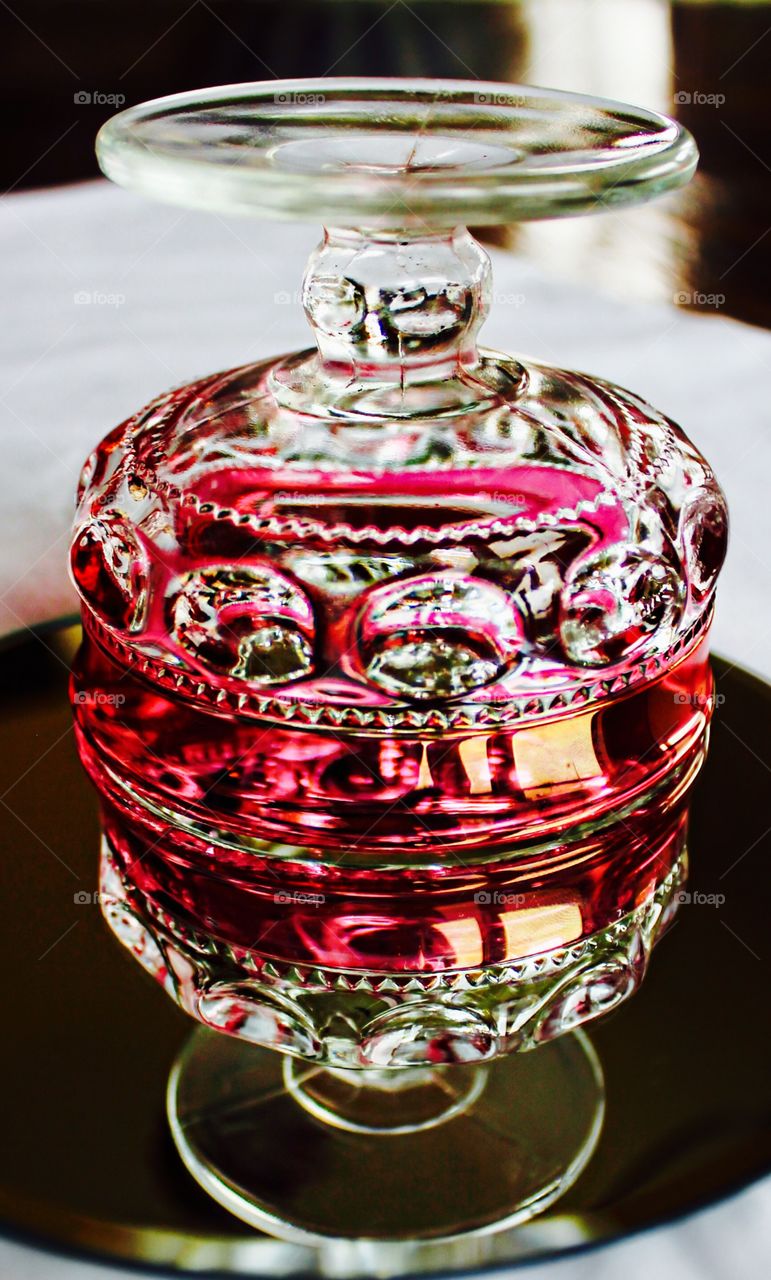 Cranberry crystal reflection.