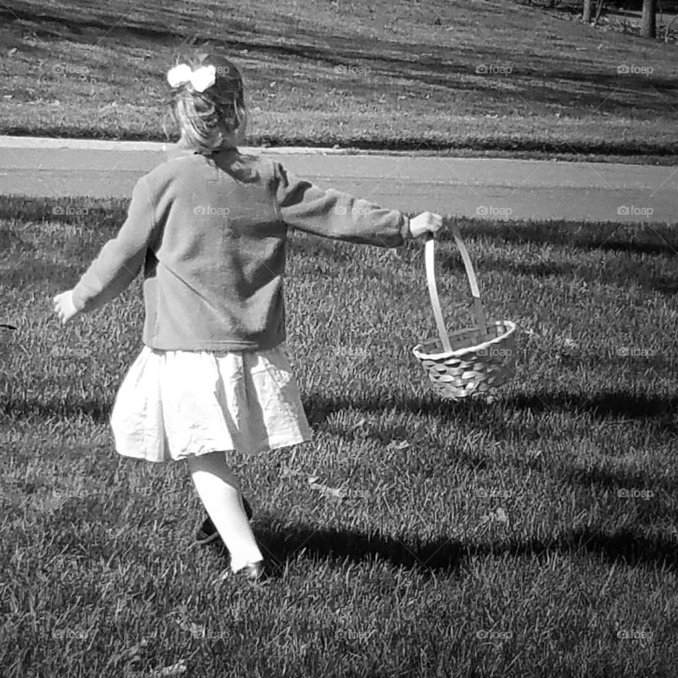 My Niece Running with a Basket. Easter Sunday my niece runs with her Easter basket full of joy.