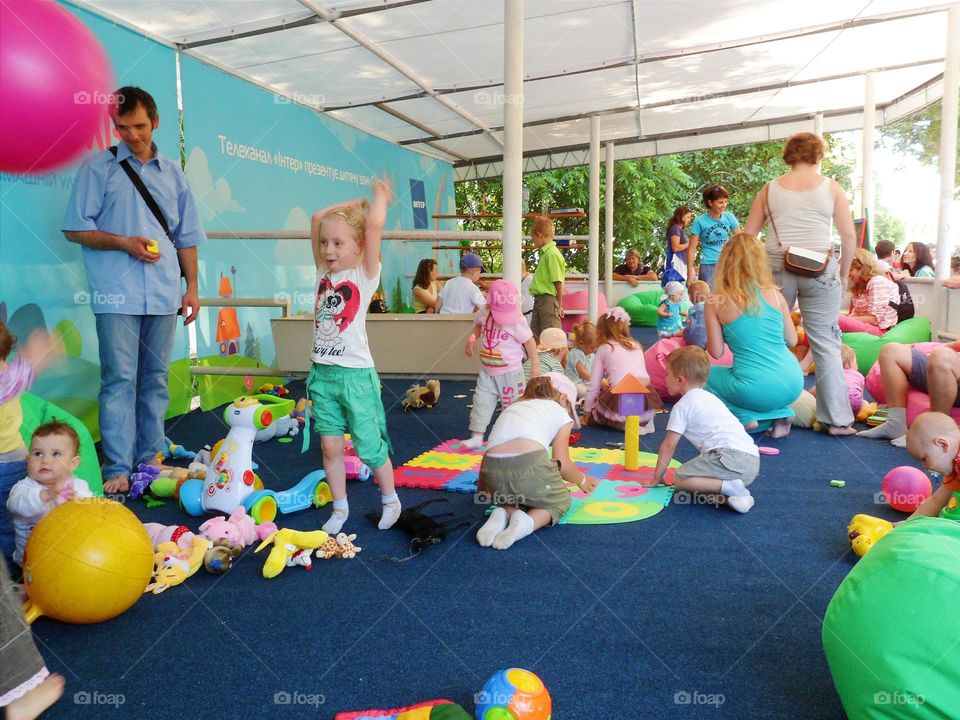 children play in the play area