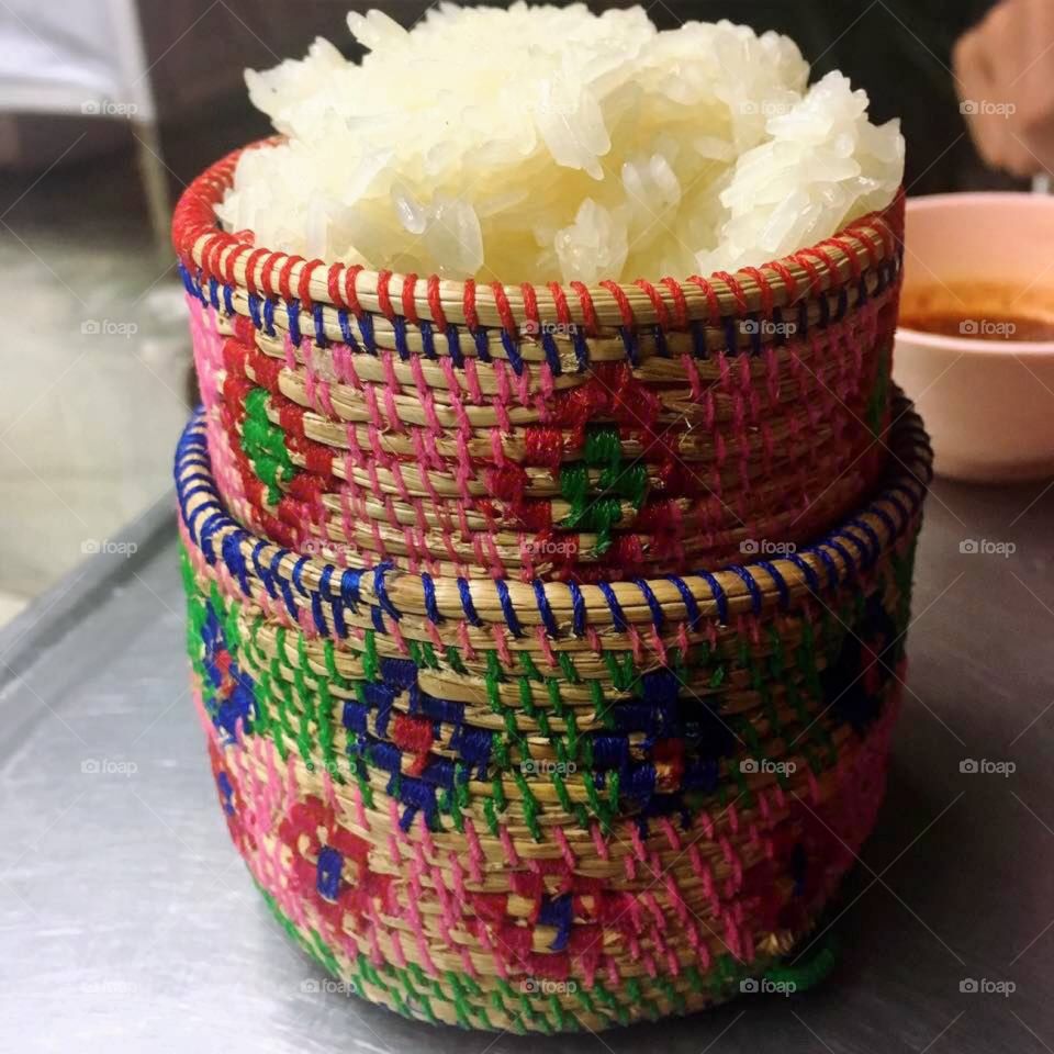 Thai Sticky rice in woven platter.