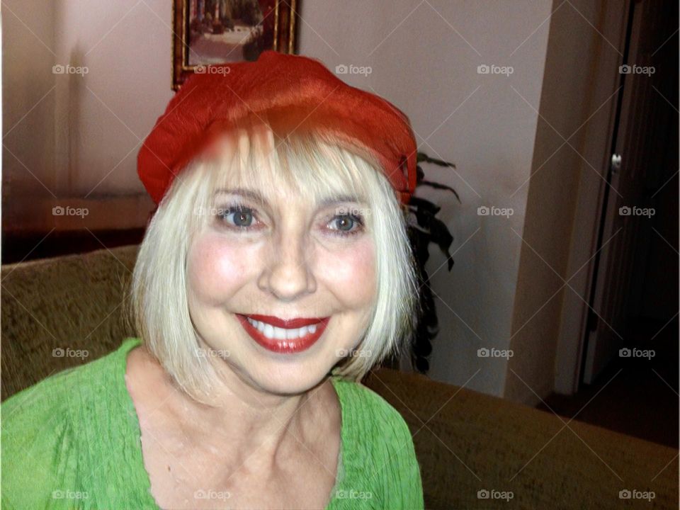 Beautiful woman wearing red and green.