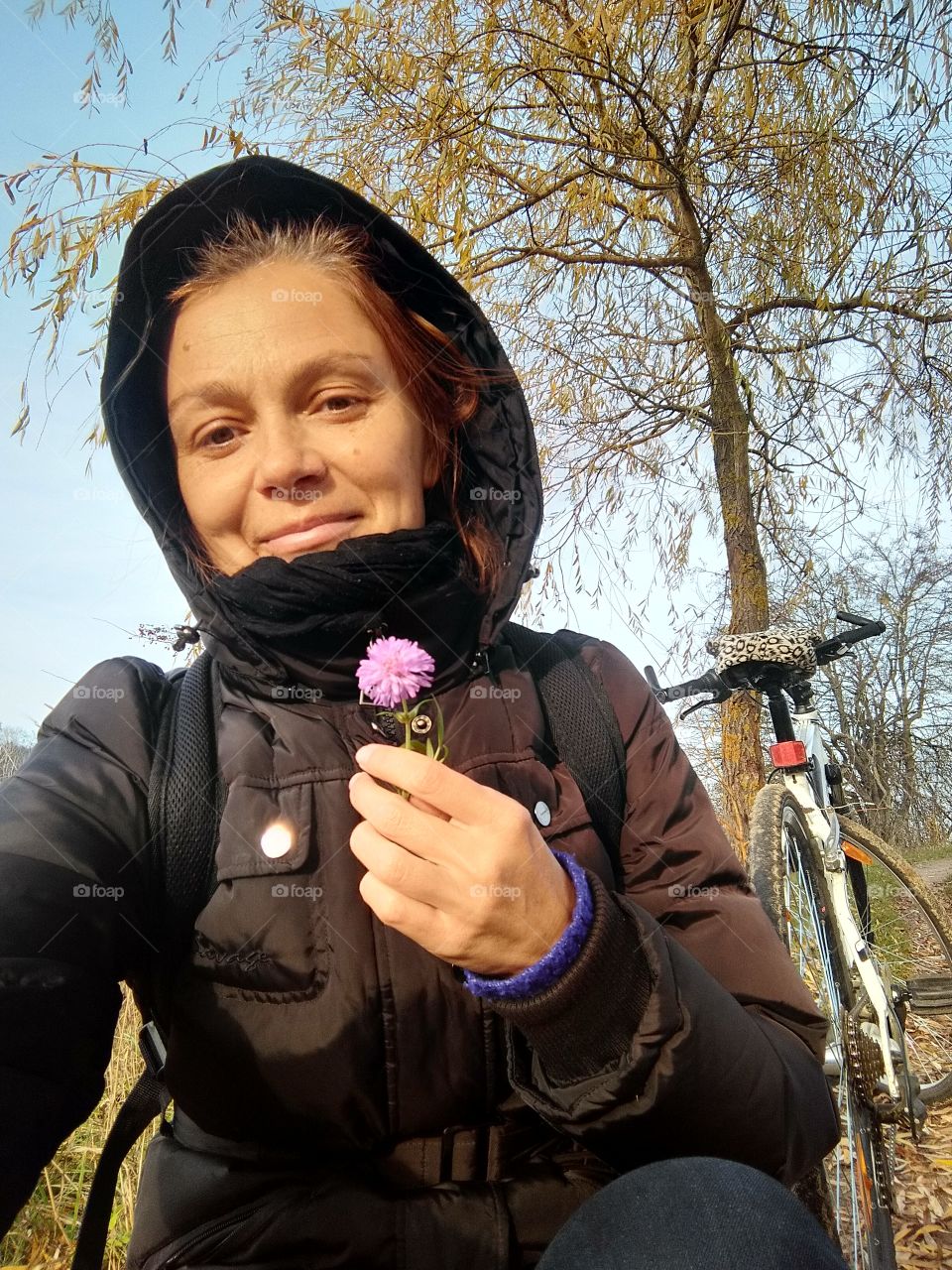 selfie girl on the nature with flower autumn time