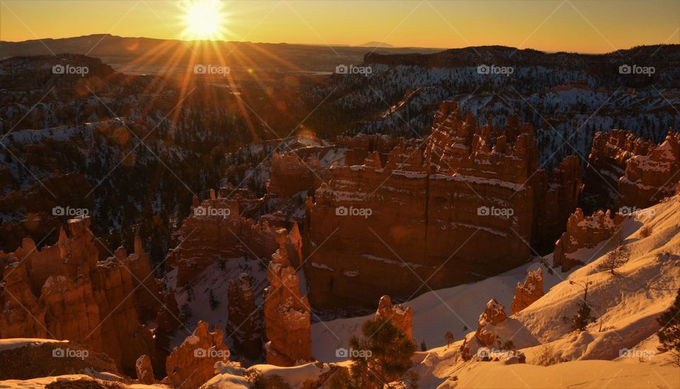 Sunrising on snow mountain