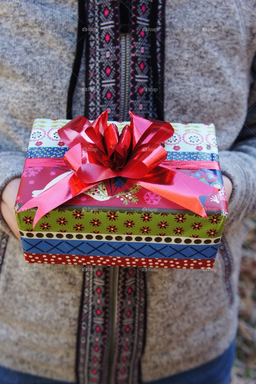 Woman holding christmas gift