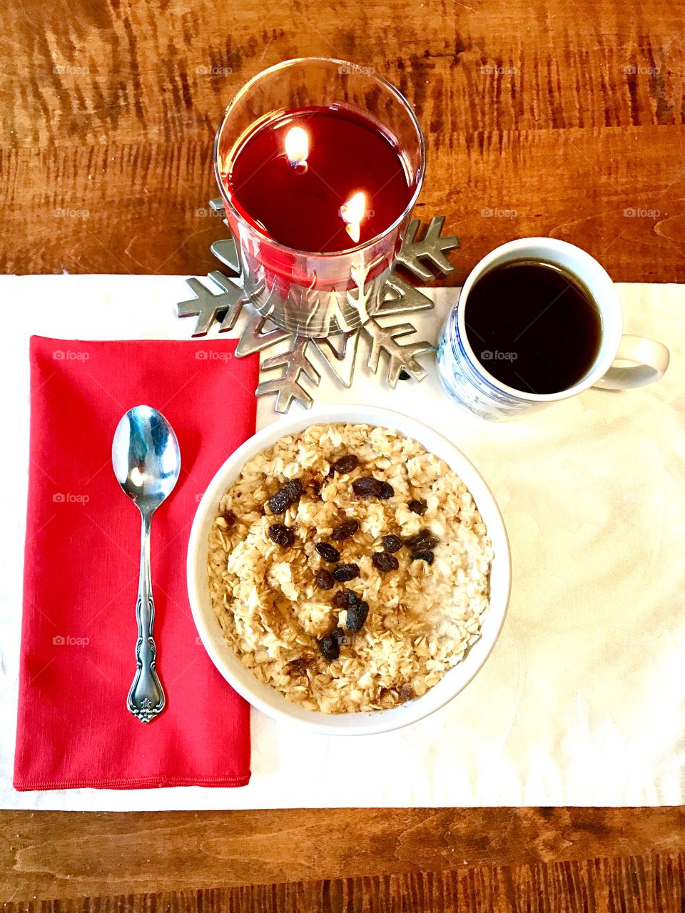 Elegant breakfast of oatmeal and raisins for a cold morning
