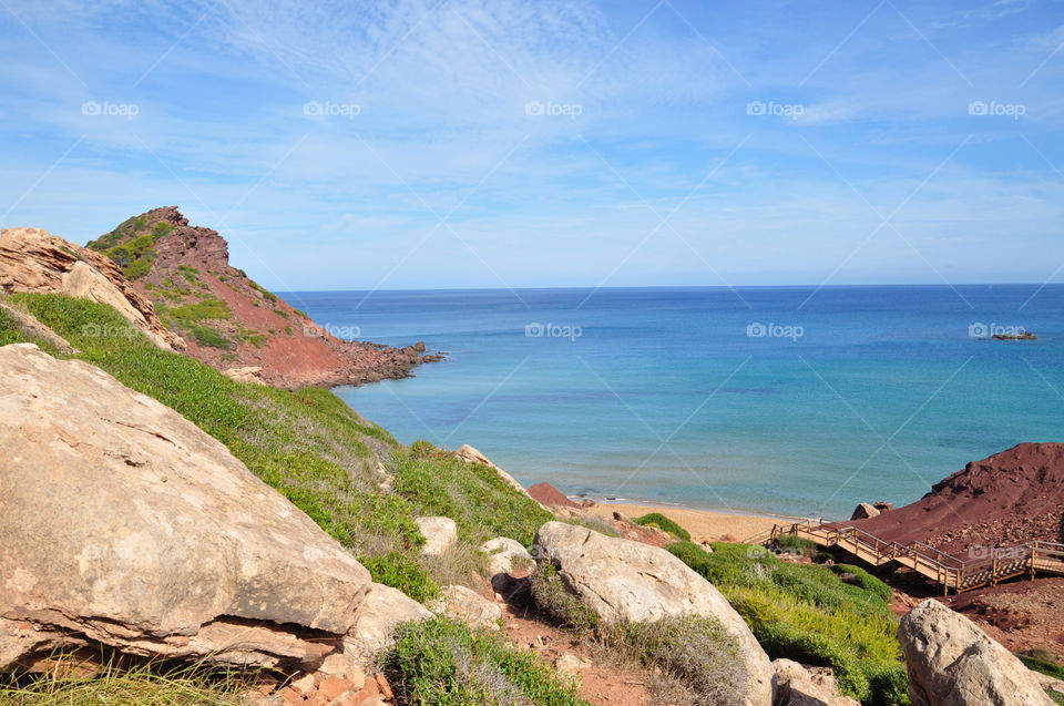 cliffs and beach on menorca Balearic island in Spain