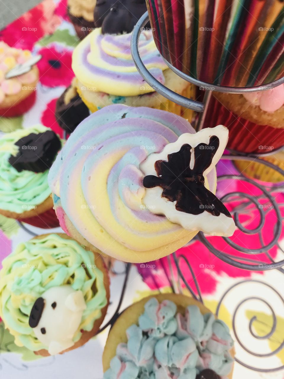 Delicious homemade colorful circular cupcake with dark and white chocolate mold! 