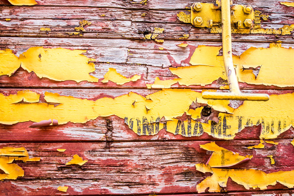 Flaking Paint On Old Wagon Wooden Side
