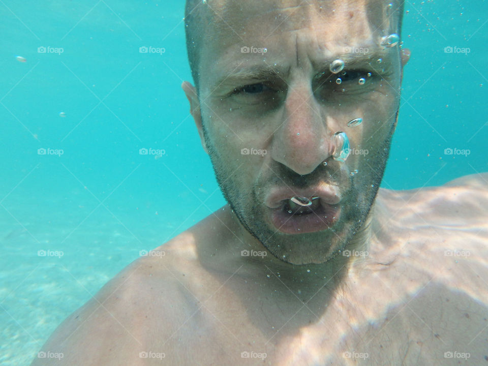 man underwater. portrait of a man underwater