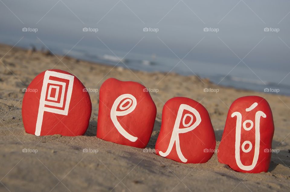 Peru, original logo on painted stones