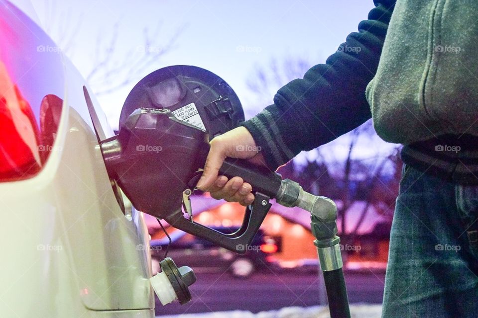 refill gas at gas station