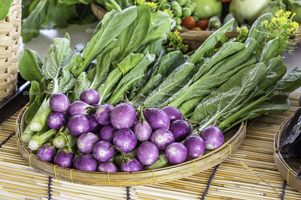 Eggplant and Chinese kale ,Vegetables in bamboo baskets.