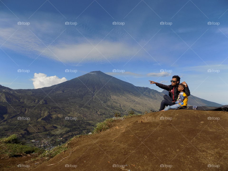 adventure son family Lombok Indonesia summer mountain hills Sembalun