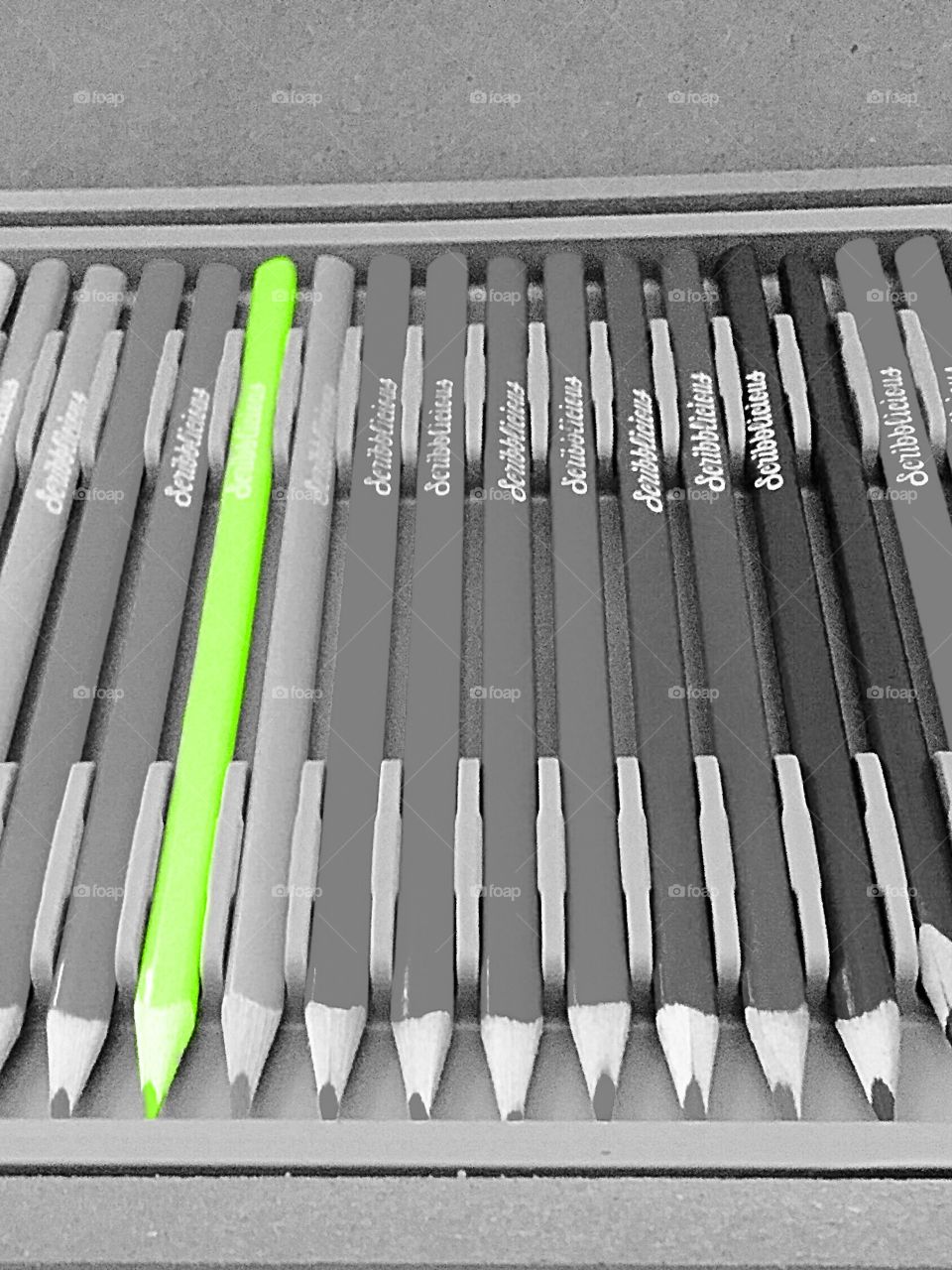 Green pencil. Colouring pencils with the green highlighted