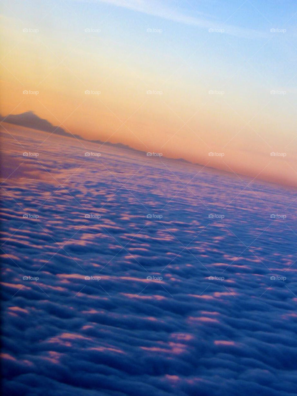 Above the clouds flying