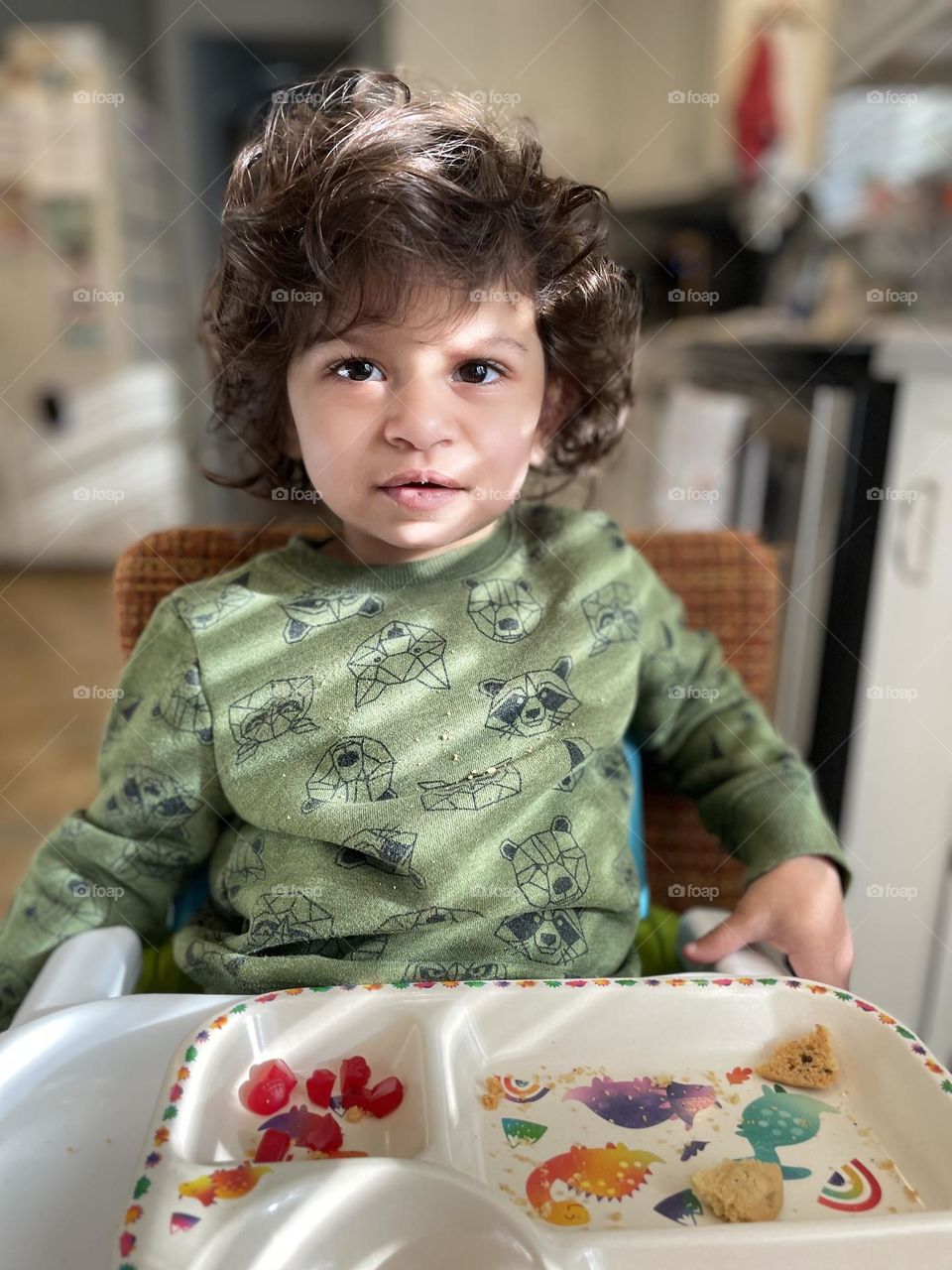 Child disgusted with snacks, toddler not happy with snack choices, toddler shows disgust on her face, child showing emotion of disgust on face, facial expressions of a toddler, showing disgust over meal