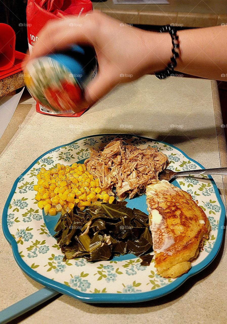 supper! pulled pork seasoned with Cajun seasonings, Texas Pete and Kraft Original BBQ Sauce, Collard Greens seasoned with pork fat and love! Buttered corn with beef bouillon and a bit of Cajun seasonings with fried corn bread! bon Appétit!