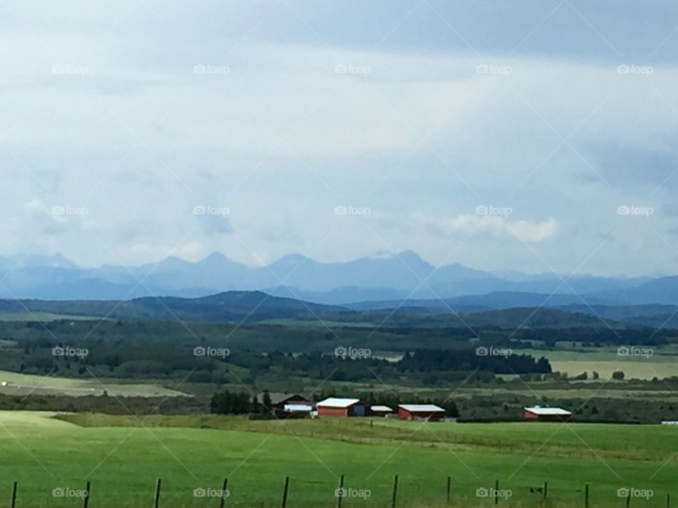 Layers of the Canadian mountains and farmland