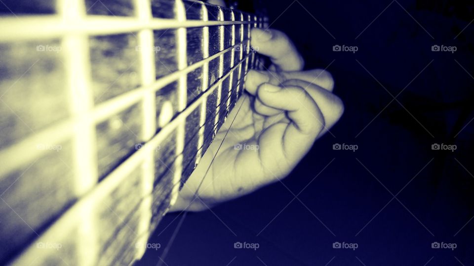 Playing guitar. A photo of me playing guitar (nostalgic touch)