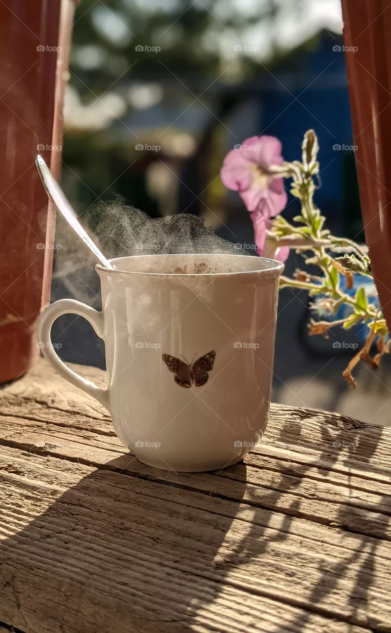 Morning cup of hot coffee